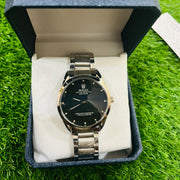 Rolex watch in a blue box on grass